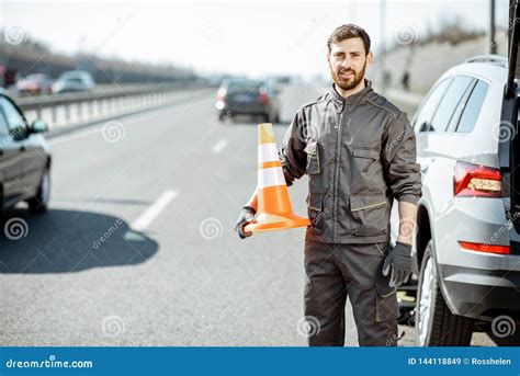 Road Assistance Worker On The Roadside Stock Image Image Of Sign Breakdown 144118849