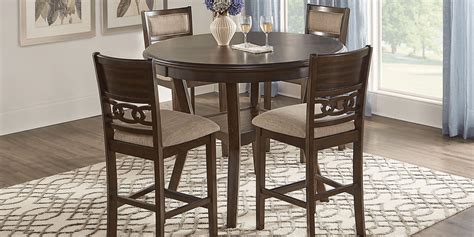 Brookgate Brown Cherry Dark Wood Counter Height Round Dining Table Rooms To Go