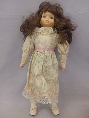 Lot 26 Brunette Porcelain Cloth Doll Grand Oak Auctions