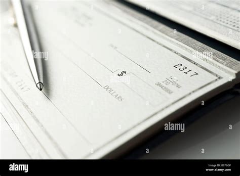 Cheque Book And Pen Stock Photo Alamy