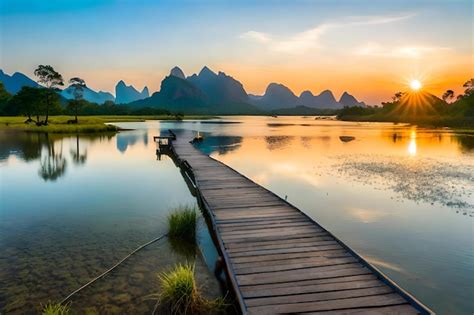 Premium Photo | A wooden bridge over a lake at sunset