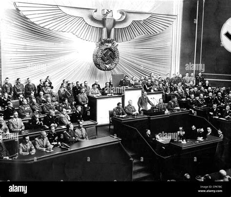 Chancellor Adolf Hitler during his speech to the Reichstag announcing the invasion of Poland ...