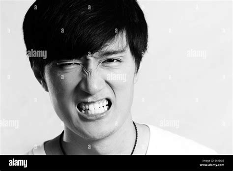 Portrait Of Young Man Looking Angry And Yelling Black And White Style