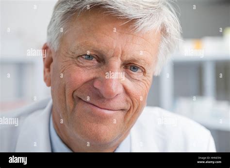 Smiling Mature Doctor Stock Photo Alamy