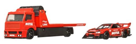 Hot Wheels Traktor In Dirkalni Avto Team Transport Nissan FLF Mimovrste