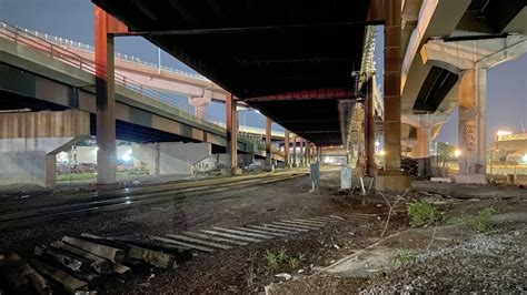 Inbound MBTA Train Underneath Interstate 93 Heading To North Station