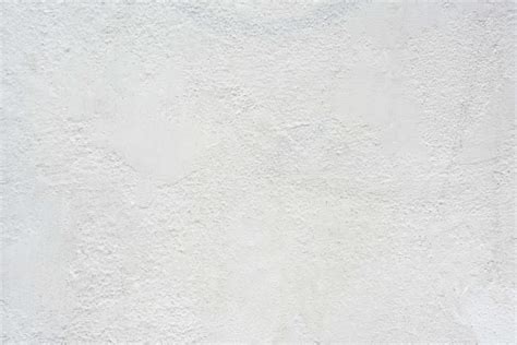 Download White Wall Background With Feint Rough Textures | Wallpapers.com