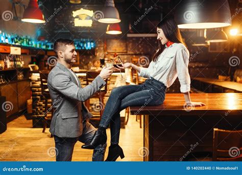 Woman Flirting With Man Couple At Bar Counter Stock Photo Image Of