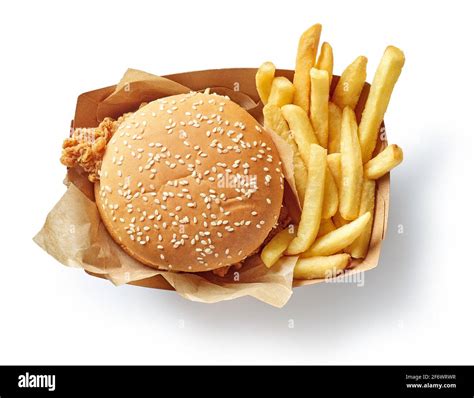 Fresh Tasty Burger And French Fries In Paper Box Isolated On White