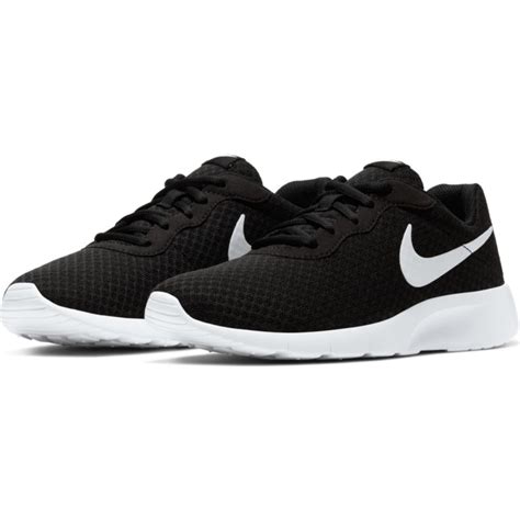 Nike Tanjun Kids Black / White - White Shaped like a running shoe with ...