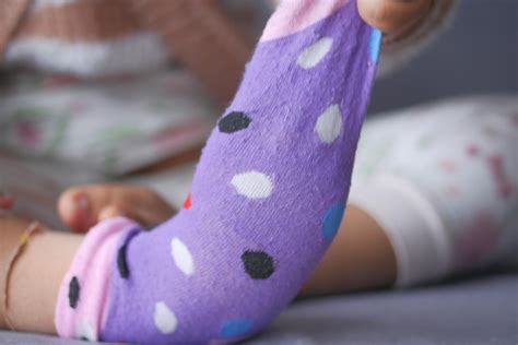 Premium Photo | A colorful soft socks on child feet