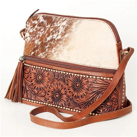 American Darling Tooled Leather And Cowhide Bag