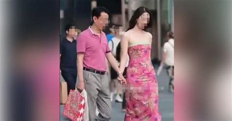 与小三牵手被街拍 中国国企高管婚外情曝光