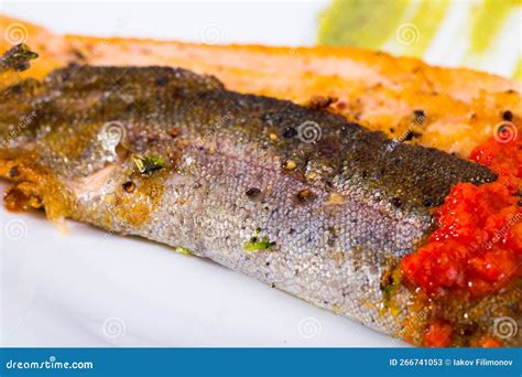 Grilled trout with sauces stock image. Image of garnish - 266741053