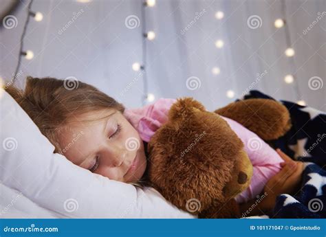 Girl Sleeping with Teddy Bear Stock Image - Image of holding, sleeping: 101171047