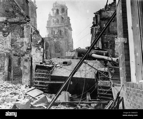 A German 'Tiger' tank destroyed in the ruins of Argentan (Normandy ...