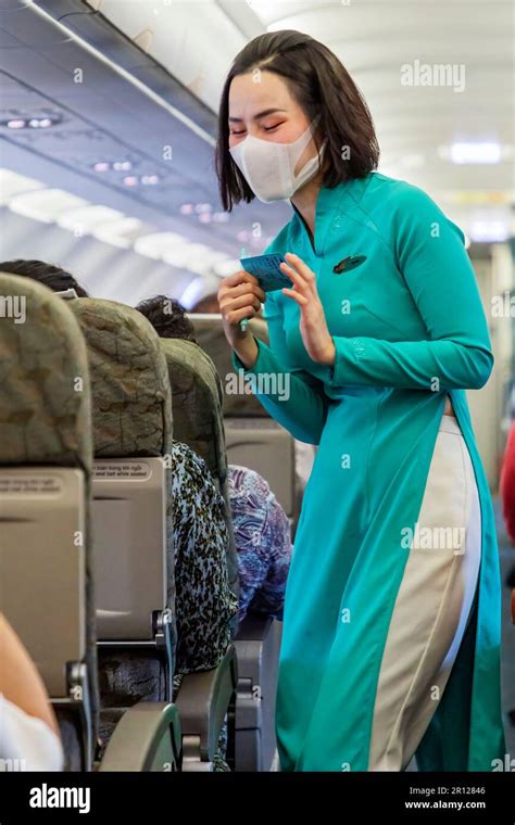 Vietnam Airlines Cabin Crew Wearing Traditional Ao Dai Uniform On