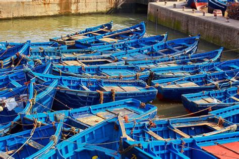 Lots Of Blue Fishing Boats In The Port Of Essaouira Stock Image Image