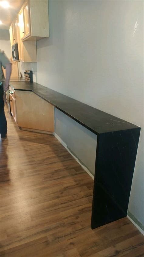 Banjo Countertop With Mitered Waterfall To Floor Soapstone Kitchen