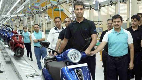 bajaj inaugurates  plant  akurdi  electric scooter rolls