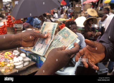 Money Hands Africa Hi Res Stock Photography And Images Alamy