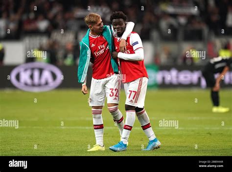 Arsenals Emile Smith Rowe And Bukayo Sako Celebrate After The Final