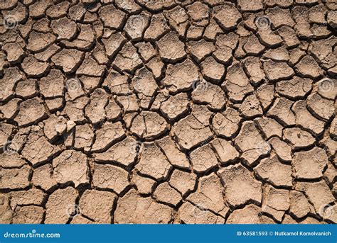 Superficie De La Grieta De La Arcilla En Terreno Caliente Imagen De