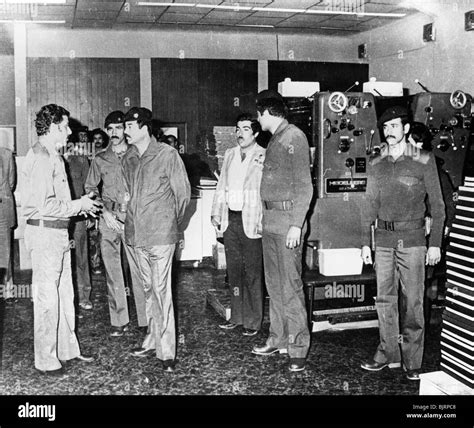 Saddam Hussein visiting a state paper press, Baghdad, Iraq, 1986 ...