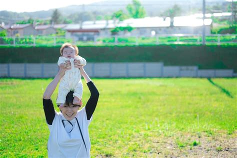 Premium Photo | Holding a baby