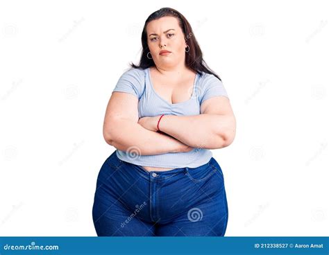 Young Plus Size Woman Wearing Casual Clothes Skeptic And Nervous