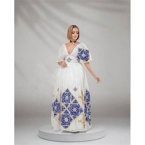 Alluring Modern Habesha Kemis With Unique Tilf Design Habesha Dress