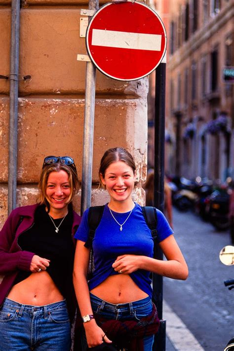 Two girls Showing Belly Buttons, Rome – Jay Maisel