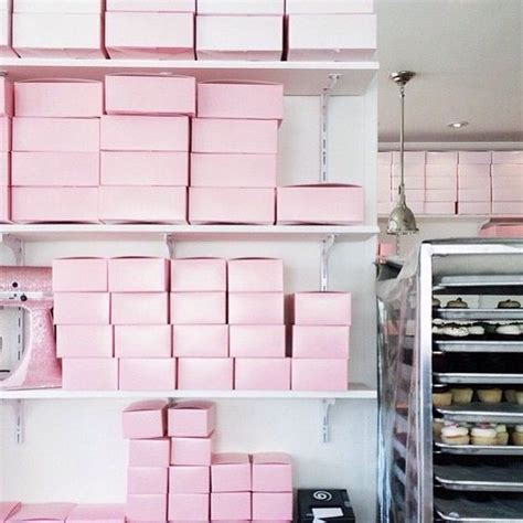 Pink Bakery Boxes On Shelves