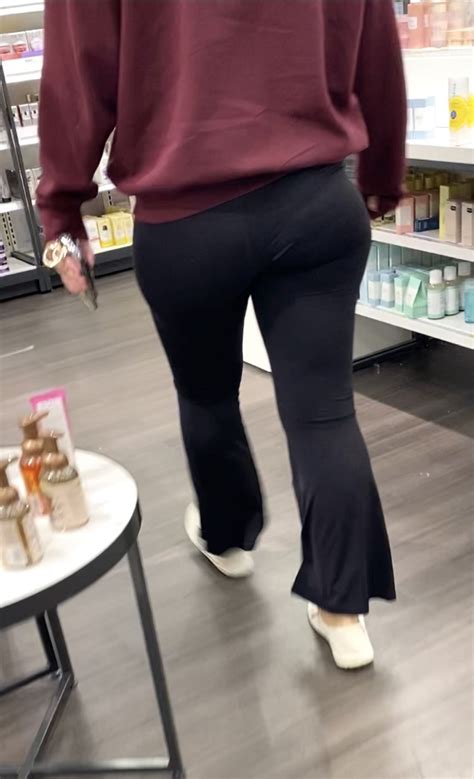 Wide Ass And Hips In Black Flares Bends Over Spandex Leggings