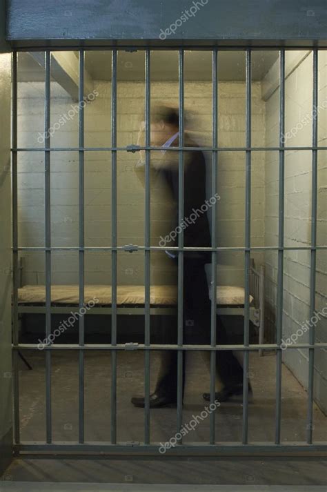 Man In Prison Cell Stock Photo By ©londondeposit 33891885