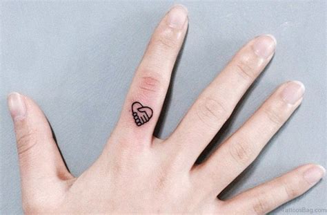 41 Awesome Love Heart Tattoos On Finger