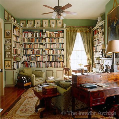 A Collection Of Miniatures Is Displayed On The Custom Made Bookcase