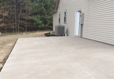 Colored Concrete Driveway and Stamped Concrete Sidewalk