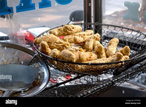 Batagor (Bakso Tahu Goreng) is served with peanut sauce and sauce ...