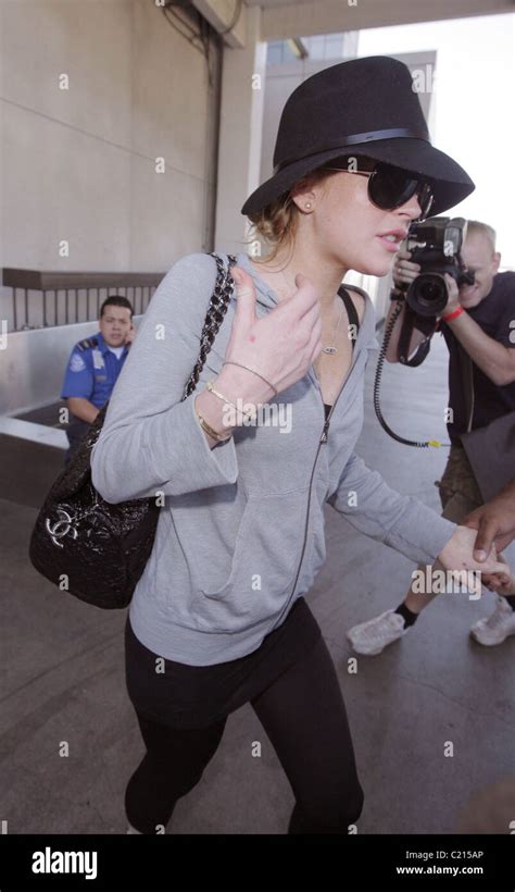 Lindsay Lohan Arrives At Los Angeles International Airport Los Angeles