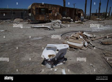 Abandoned Broken Dirty Toilet And Trashy Trailer In Salton Sea