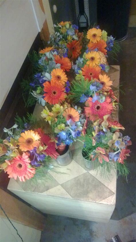 Blue and orange bouquets