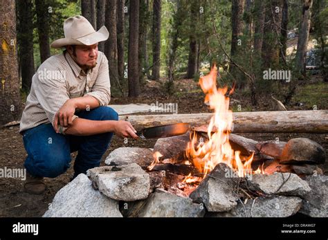 Cowboy Cooking Steak Over A Fire Stock Photo 66007767 Alamy