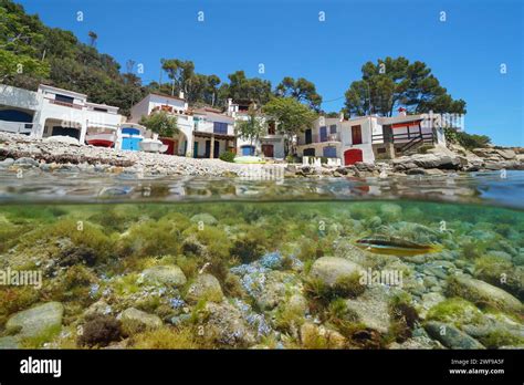 Spain Mediterranean Fishermens Houses On The Sea Shore Of A Rocky