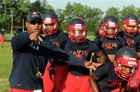 Aldine Davis begins football practice