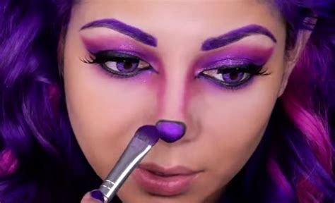 How To Perfect The Cheshire Cats Purple Makeup Look For Halloween