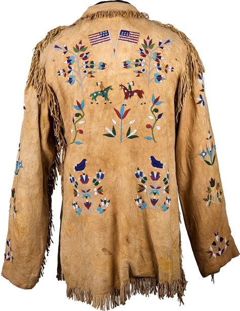 A Santee Sioux Pictorial Beaded And Fringed Hide Jacket C 1890