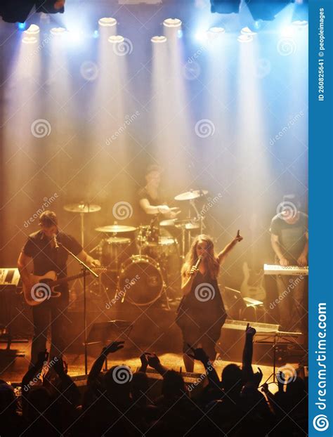 A Rock Band Delivering a Riveting Performance. this Concert Was Created ...