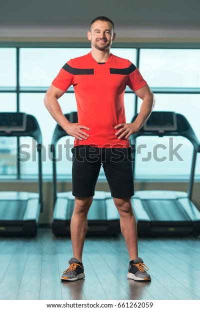 Portrait Handsome Personal Trainer Wearing Sportswear Stock Photo