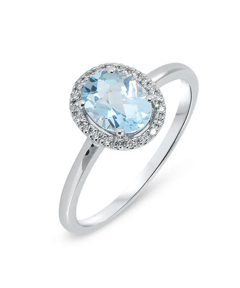 Bague Or Blanc 750 Topaze Bleue Ovale 8x6mm Et Diamant Ref 42567